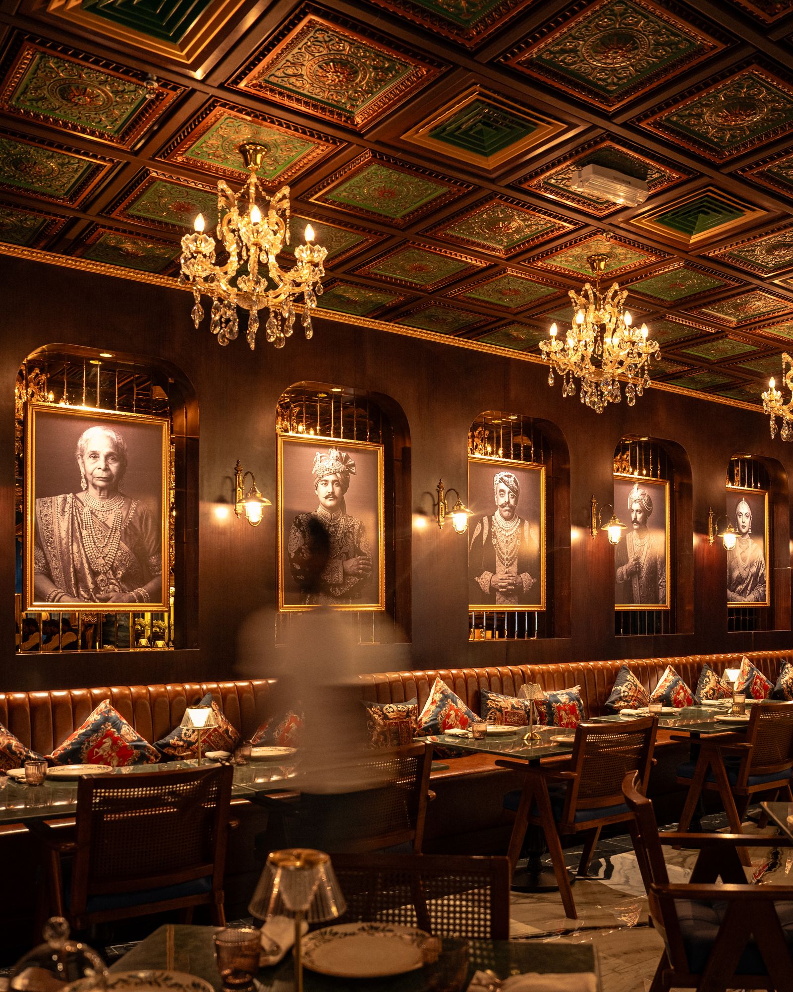 Image may contain Leela Majumdar Edmondo de Amicis Chandelier Lamp Indoors Restaurant Architecture and Building