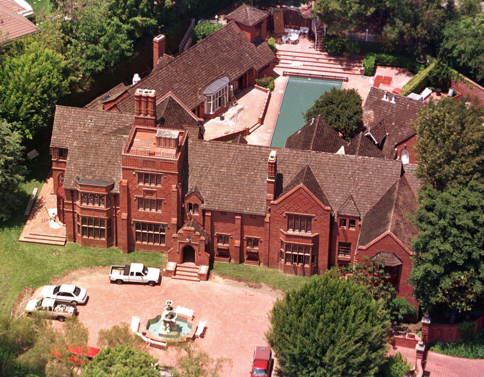 Image may contain Architecture Building Housing Outdoors House Roof and City