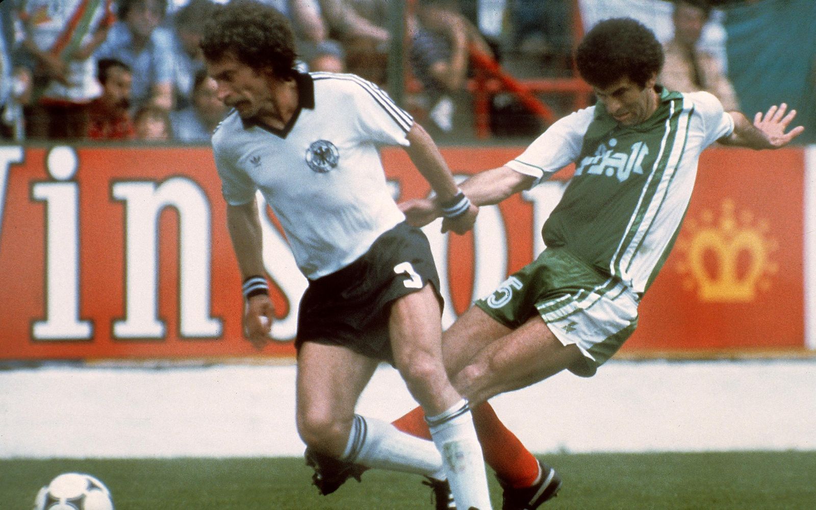 Image may contain Algeria world cup Paul Breitner Person People Clothing Footwear Shoe Shorts Face and Head