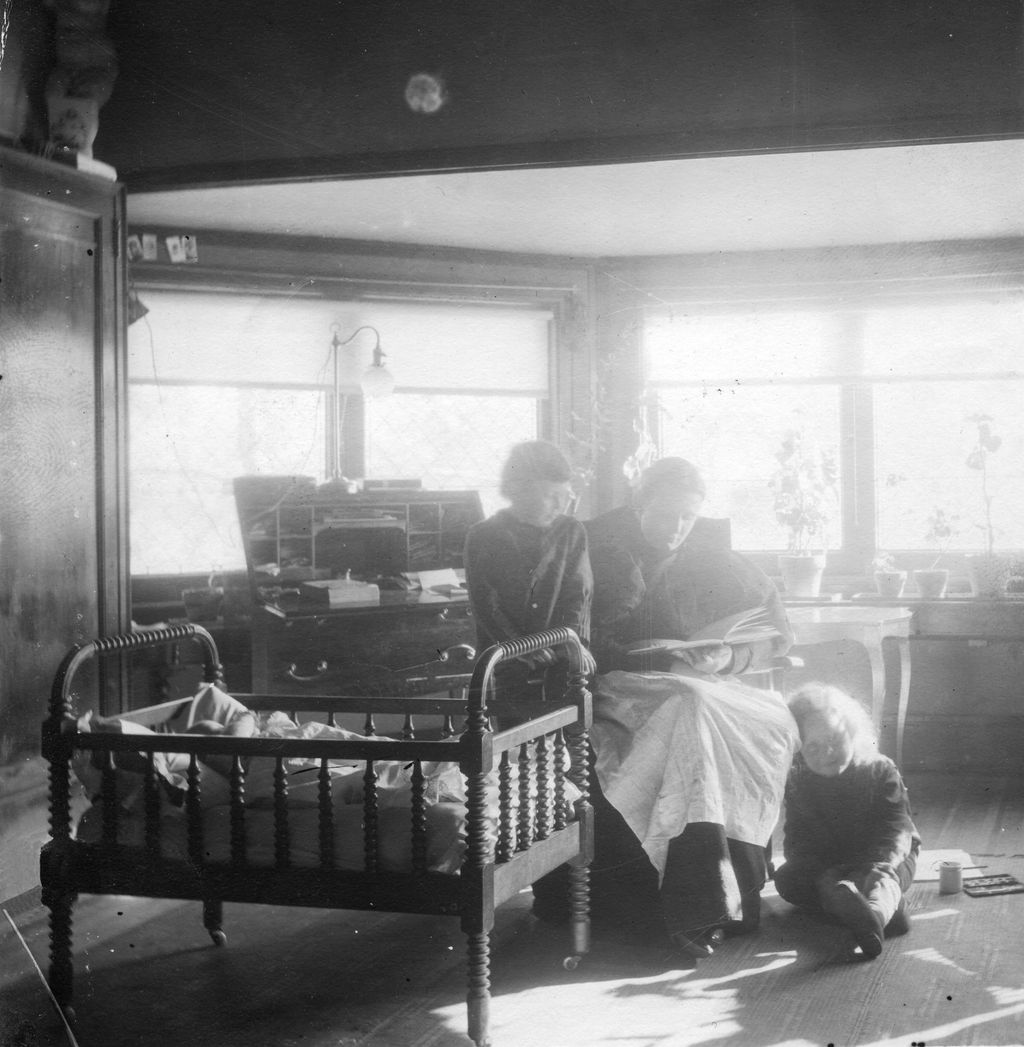 Catherine Tobin Wright with Lloyd  John  and Catherine  in Home dayroom at the Frank Lloyd Wright Home and Studio