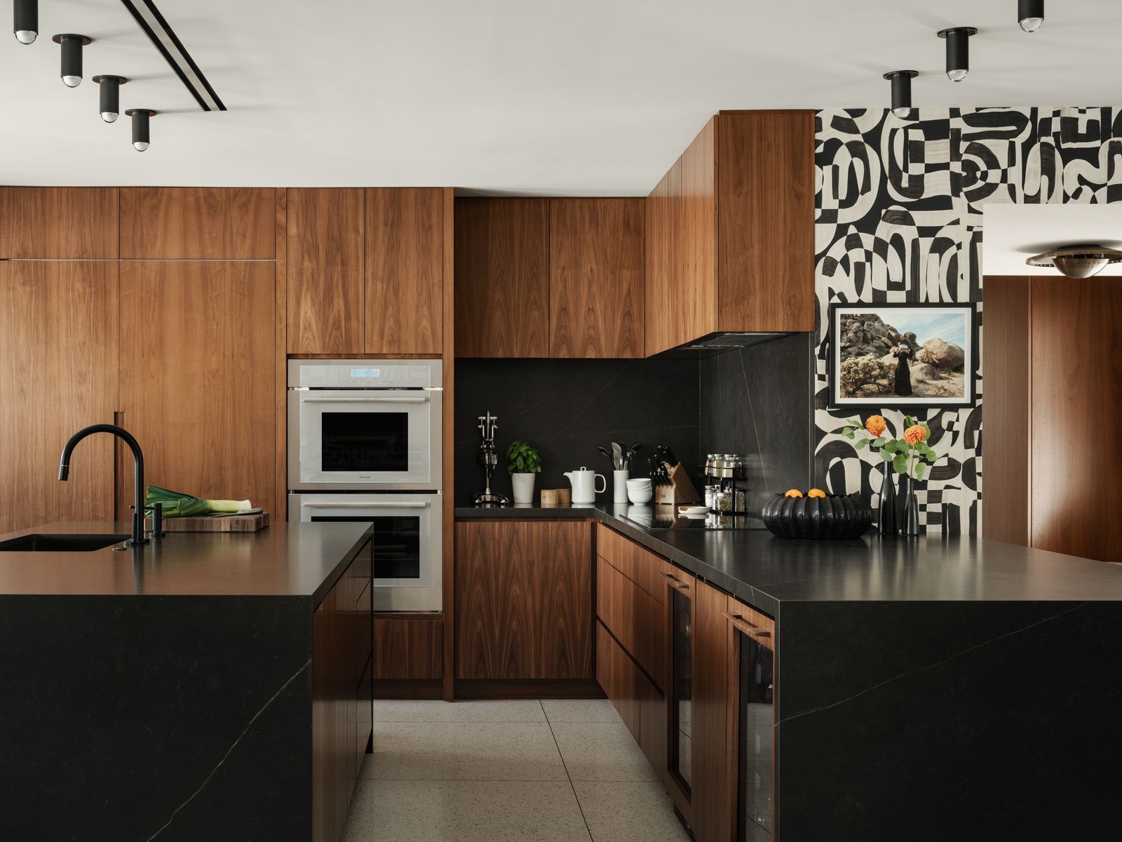 Image may contain Indoors Interior Design Kitchen Wood Panels Wood Appliance Device Electrical Device and Microwave