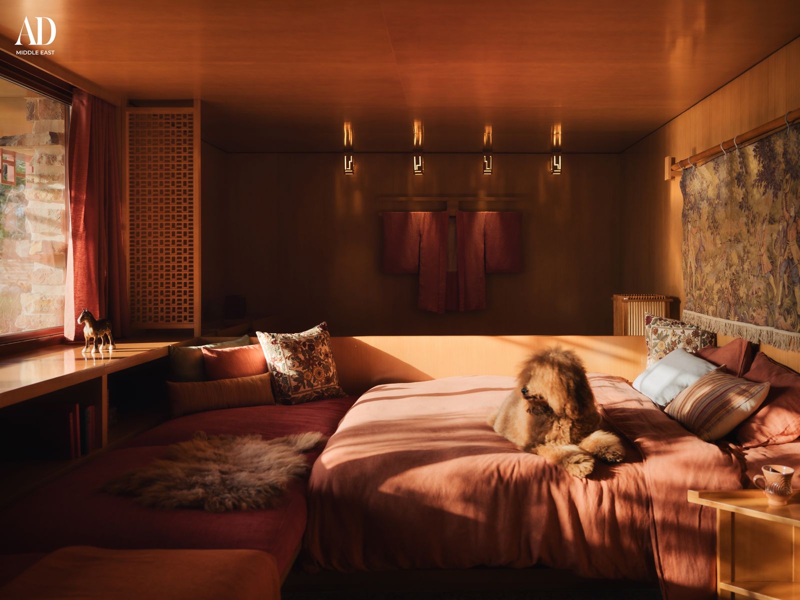 Image may contain Indoors Interior Design Lighting Cushion Home Decor Bed Bedroom Dorm Room Furniture and Room