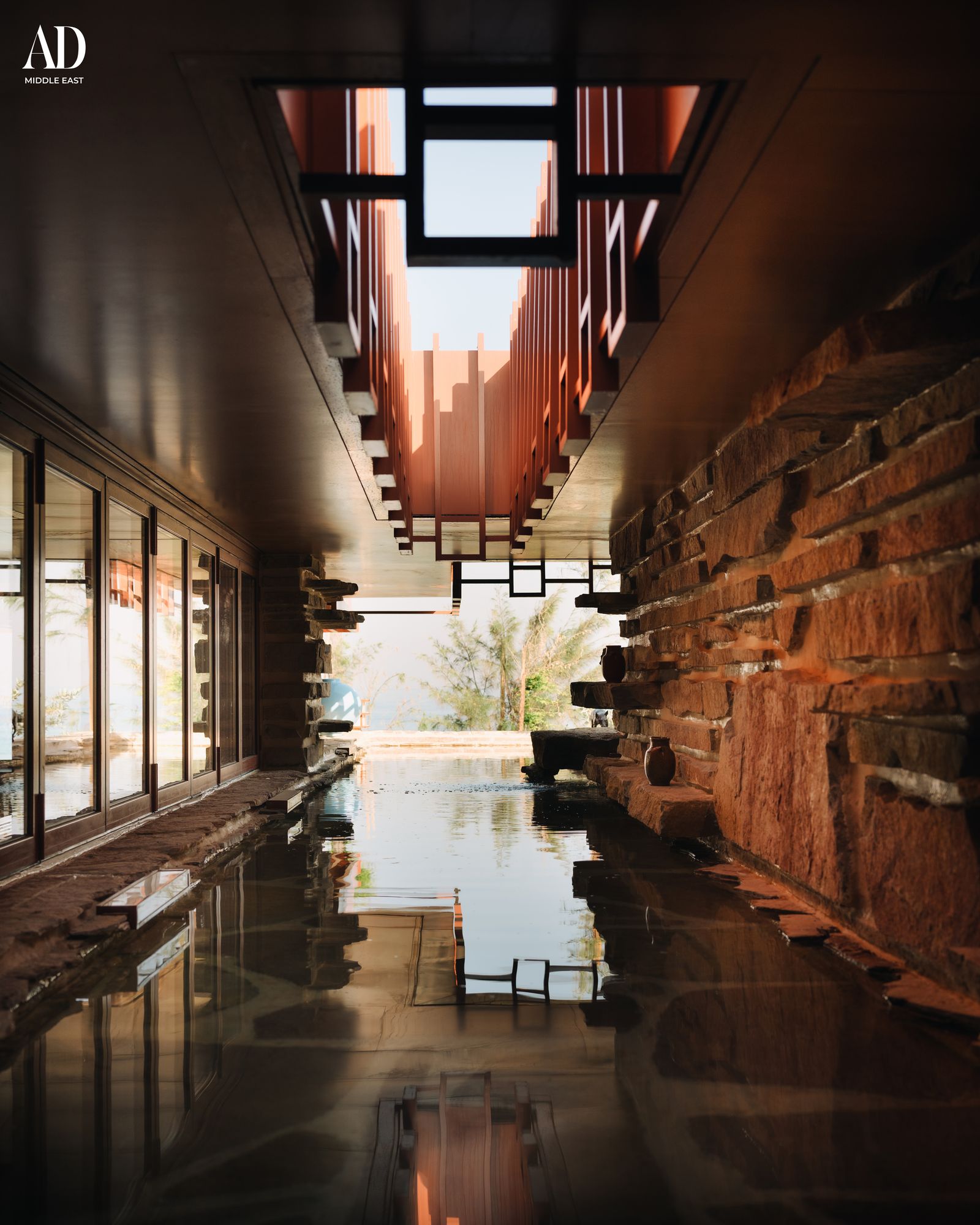 Image may contain Indoors Interior Design Floor Architecture Building Pool Swimming Pool Water House and Housing