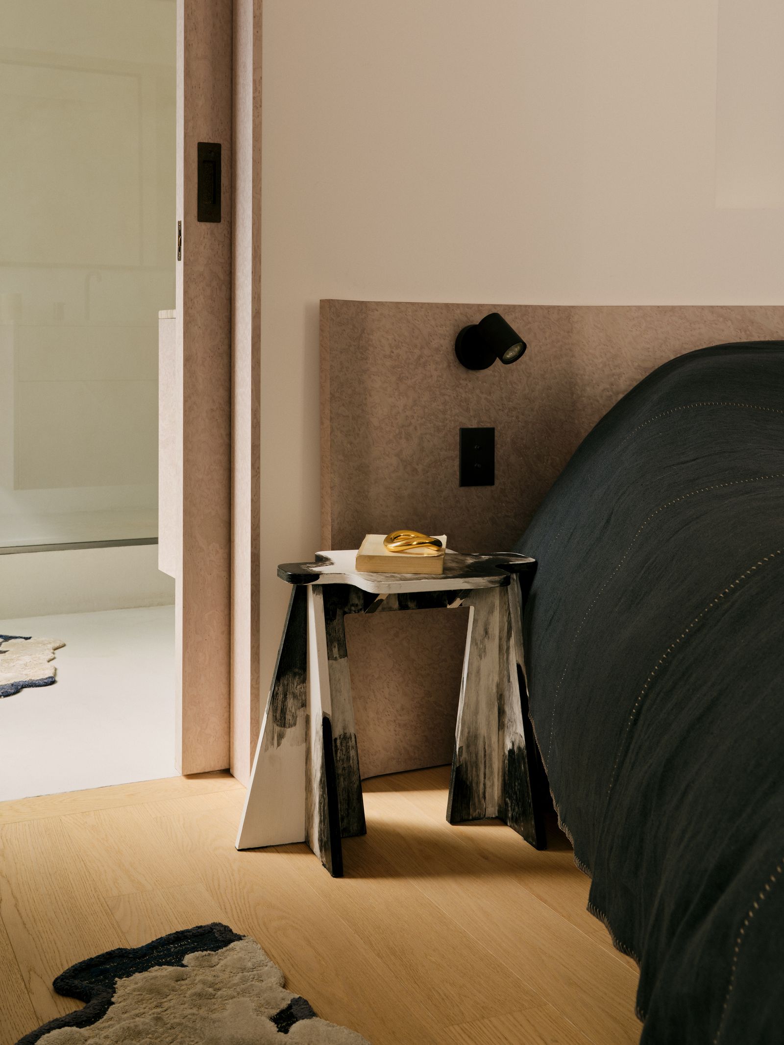 Image may contain Indoors Interior Design Floor Flooring Plywood Wood Home Decor Bed Bedroom and Dorm Room