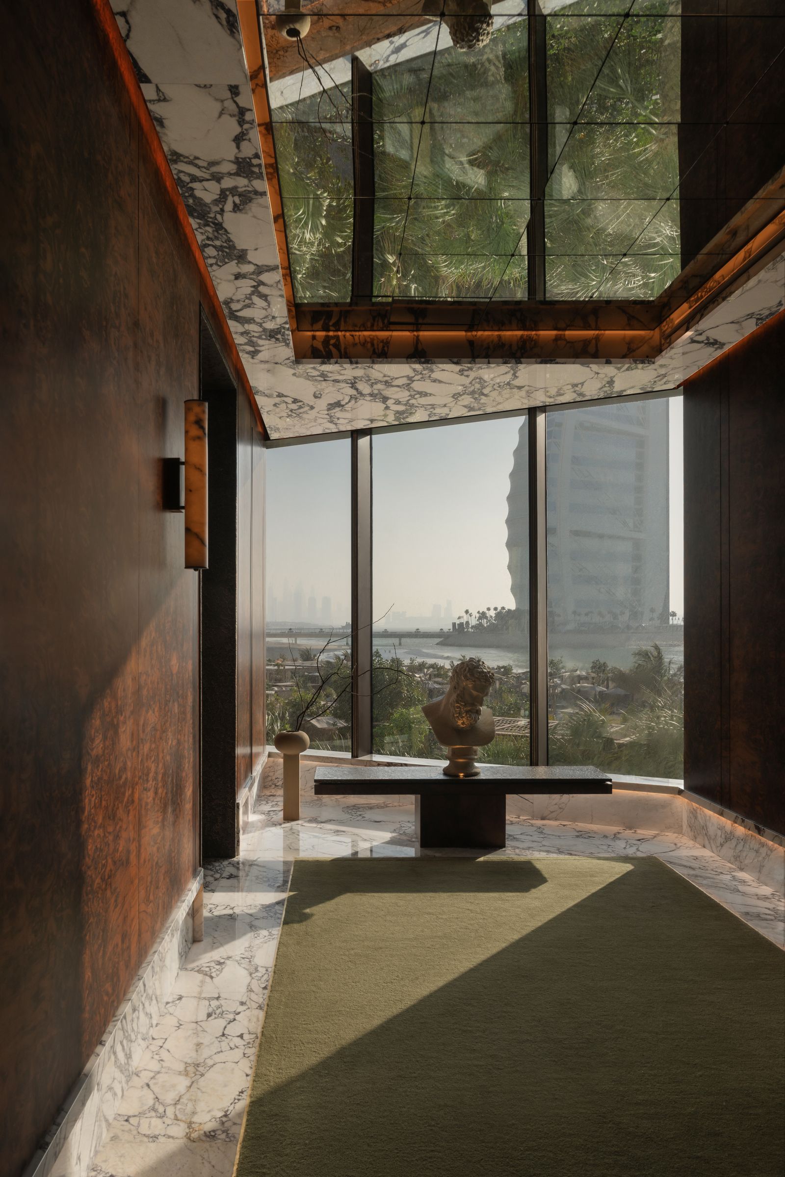 Image may contain Floor Home Decor Indoors Interior Design Flooring City Rug Person Architecture and Building