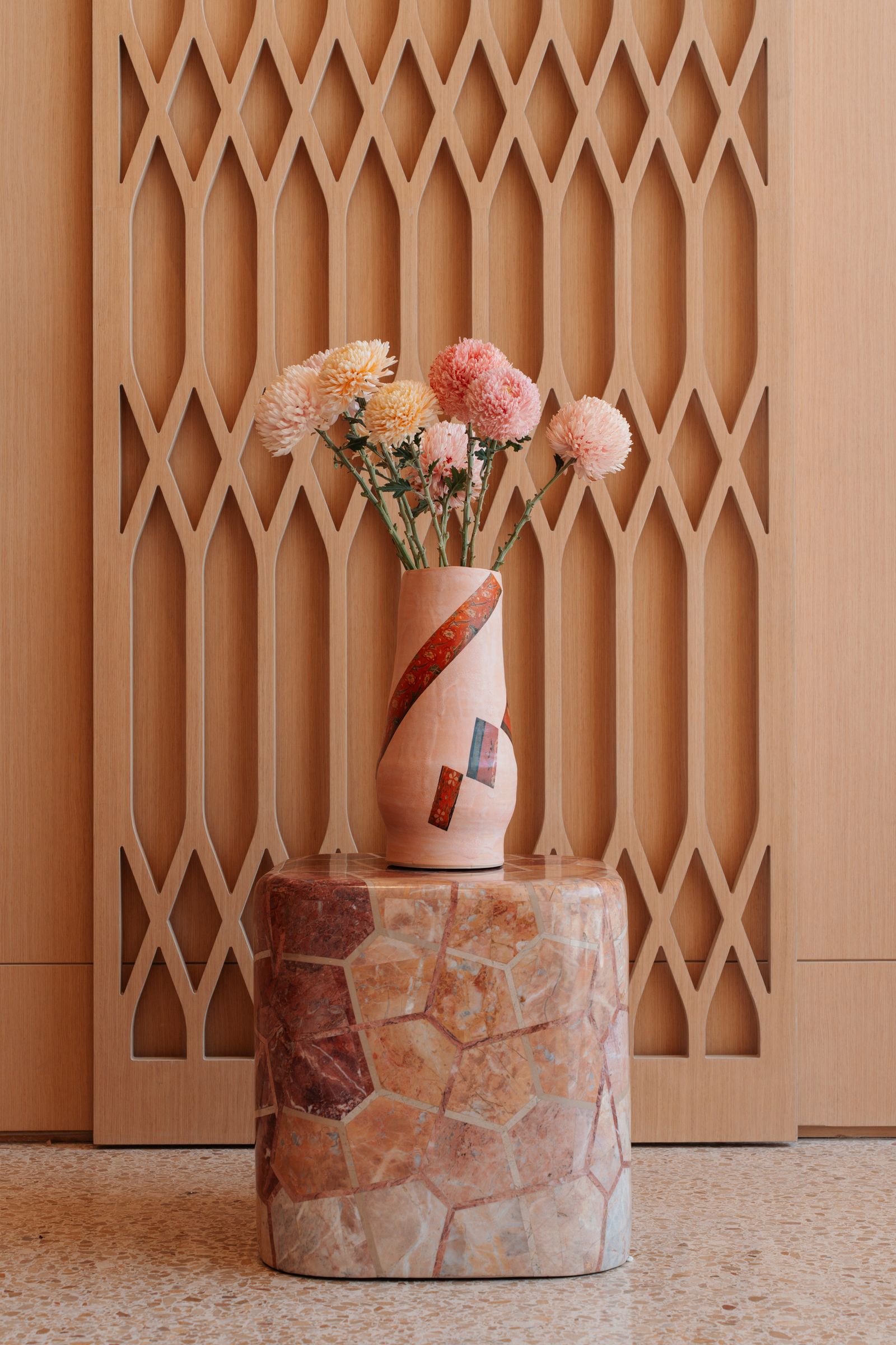 Image may contain Indoors Interior Design Wood Wood Panels Flower Plant and Door