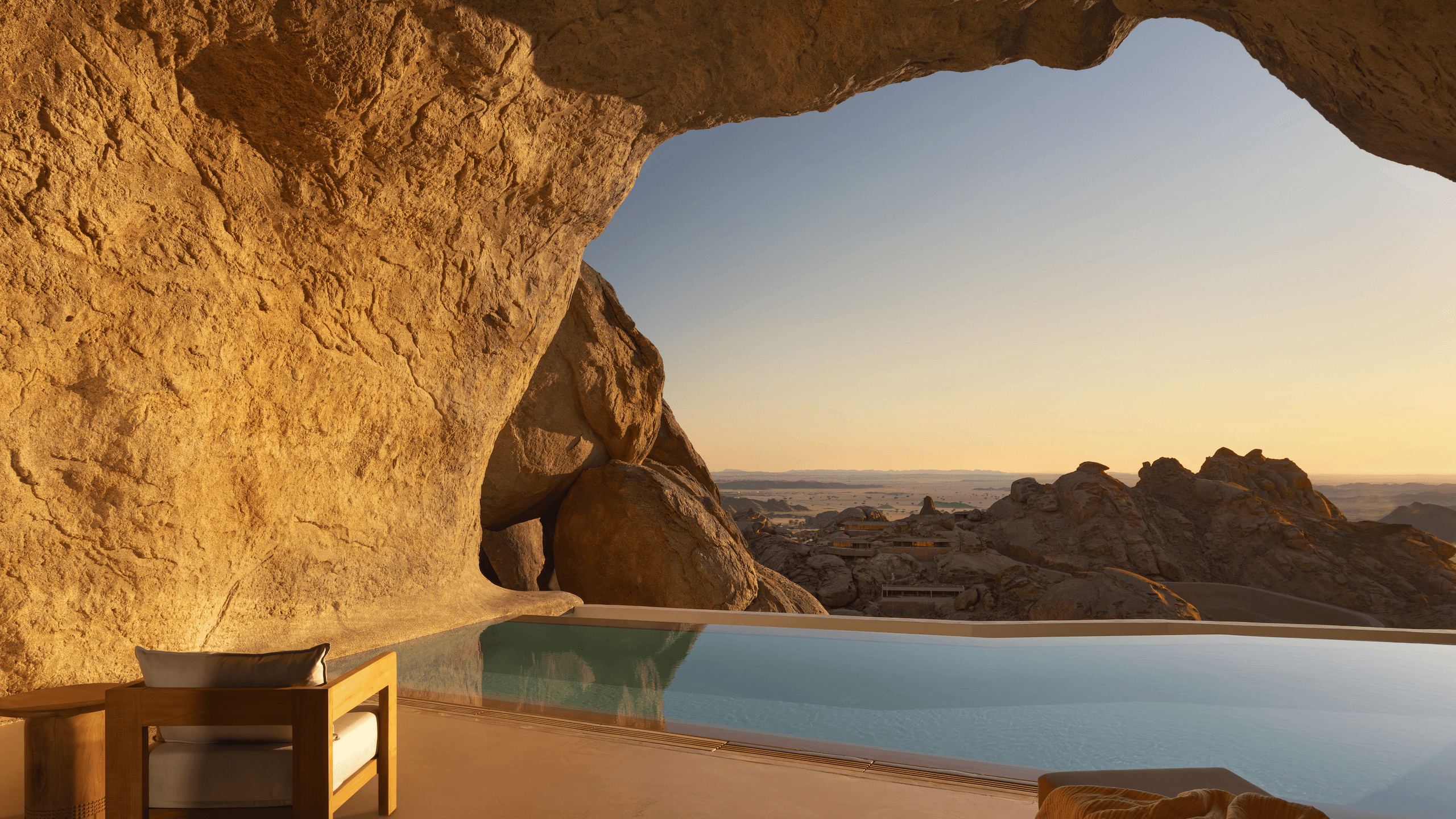 Best hotels in 2025. desert rock in red sea saudi arabia. desert rock has rock cave suite with swimming pool carved into...